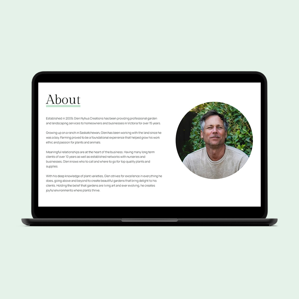 Mockup showing a laptop with Glen Nyhus Creations website homepage